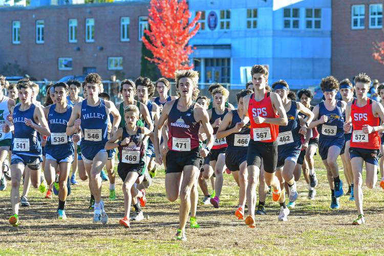Concord’s Spencer Clemans (469) and Josiah Conley (471) lead the way off the starting line, flanked by runners from Merrimack Valley and St. Paul’s School, on Thursday at the 47th Capital Area Cross Country Championship at Merrimack Valley High School.