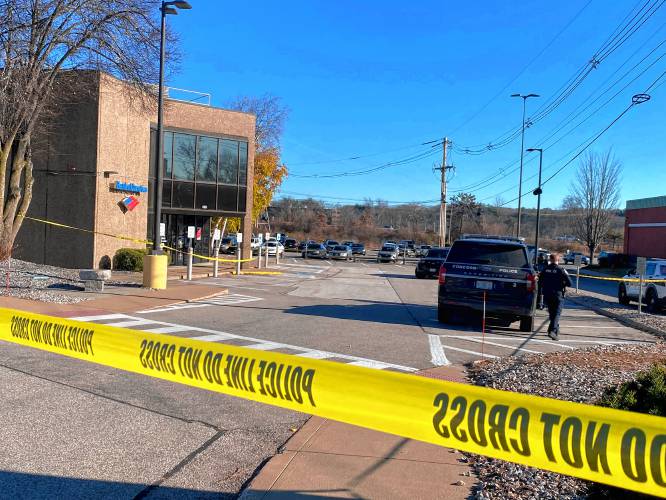 Multiple Concord police officers were seen outside the Bank of America on Storrs Street Wednesday morning.