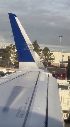This image provided by Brian O'Neil shows a damaged plane's wingtip after two JetBlue planes made contact in a minor collision at Boston Logan International Airport on Thursday, Feb. 8, 2024 in Boston. An airport authority spokeswoman says one plane's wingtip touched another plane’s tail while both Airbus 321 jets were in the de-icing area. (Brian O'Neil via AP) I have received permission for the following footage of the plane collision at Boston Logan International Airport between...