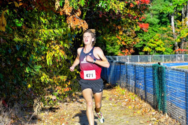 Concord’s Josiah Conley runs with a big lead at the 47th Capital Area Cross Country Championship on Thursday. Conley won the title with a time of 15:48.