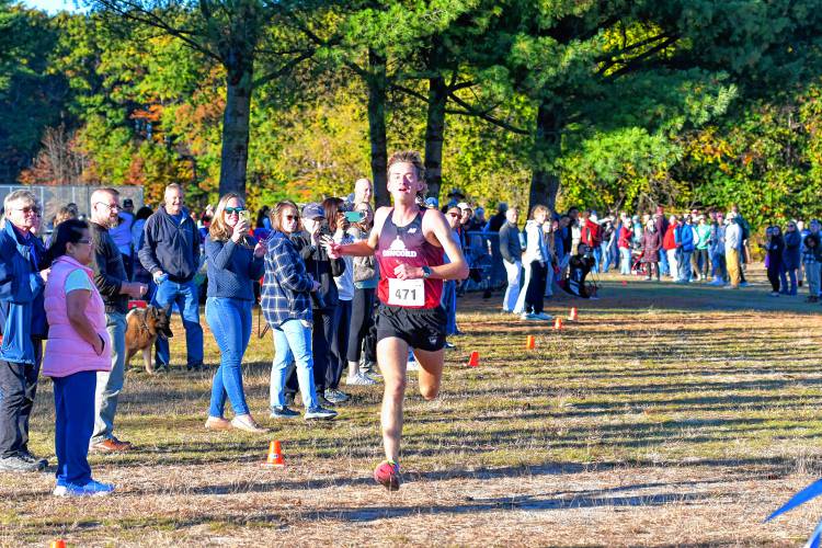 Concord’s Josiah Conley races towards the finish line at the 47th Capital Area Cross Country Championship on Thursday. Conley won the title with a time of 15:48.