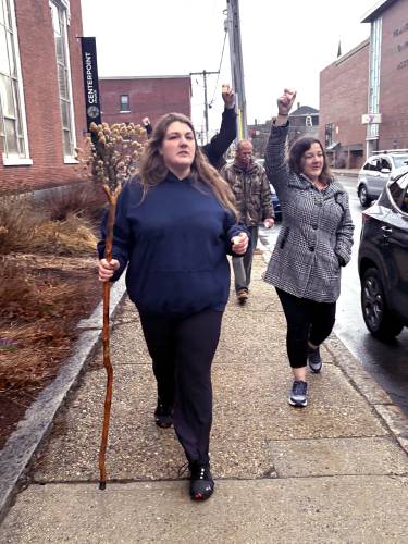 Jyanna Brideau, the niece of Rodney Moody, led the parade down North State Street and  past the State House on Saturday, March 30, 2025. Moody passed away at the Concord Coalition to End Homelessnessâs winter shelter on February 23rd. Following the service, a group walked in procession from Centerpoint Church on North State Street to the shelter in honor of Moody.