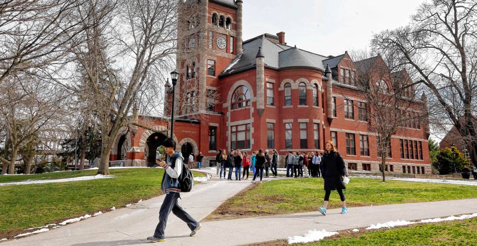 In this photo taken Wednesday April 6, 2016 students walk past the historic Thompson Hall at the University of New Hampshire in Durham, N.H. The water system serving the University is among more than two dozen in New Hampshire that have exceeded the federal lead standard at least once in the last three years. (AP Photo/Jim Cole) In this photo taken Wednesday April 6, 2016 students walk past the historic Thompson Hall at the University of New Hampshire in Durham, N.H. The water system serving the University is among more than two dozen in New Hampshire that have exceeded the federal lead standard at least once in the last three years. (AP Photo/Jim Cole)
