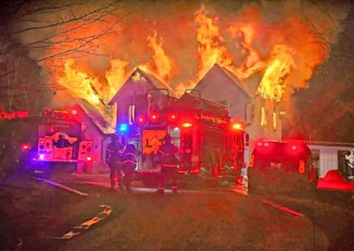 Firefighters respond to a fire on Cranberry Meadow Drive in Peterborough Monday night. 