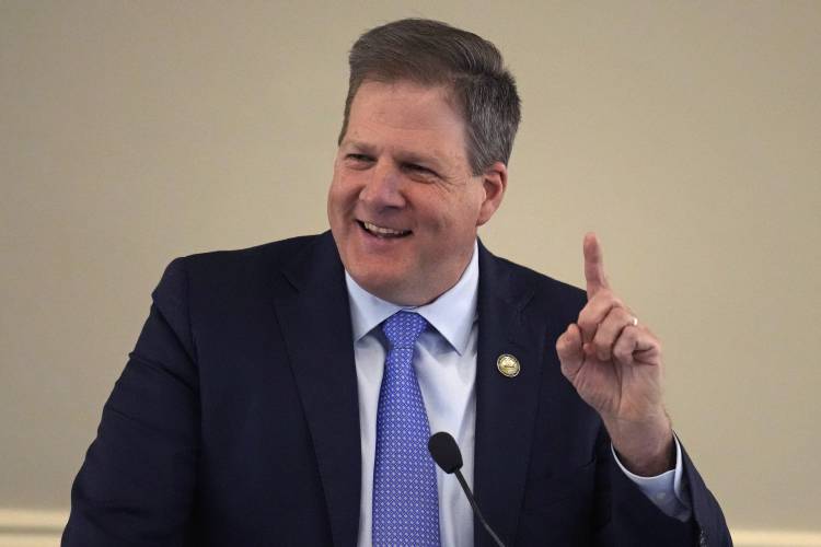 New Hampshire Governor Chris Sununu gestures during his State of the State address at the State House, Thursday, Feb. 15, 2024, in Concord, N.H. (AP Photo/Charles Krupa)