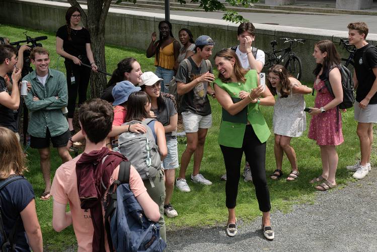 Dartmouth College President Sian Beilock takes selfies with students during a lunch event on campus in Hanover, N.H., on Wednesday, July 12, 2023. Dartmouth College President Sian Beilock takes selfies with students during a lunch event on campus in Hanover, N.H., on Wednesday, July 12, 2023.