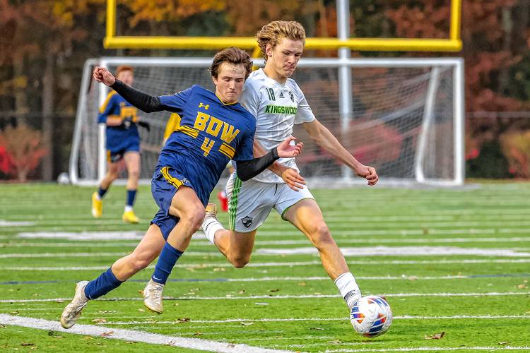 Bow’s Kody McCranie (4) and Kingswood's Keegan Russo (18) chase down a loose ball during a Division II boys’ soccer semifinal on Tuesday at Stellos Stadium in Nashua. The match was scoreless after 110 minutes, but Bow prevailed in the shootout, 3-1, to advance to the D-II championship.