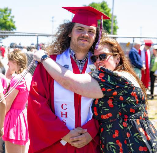 Jillian Fox gets a reluctant hug from her son, Alexavier Hildreth, after the Concord High School graduation at Memorial Field in Concord on Saturday, June 15, 2024.