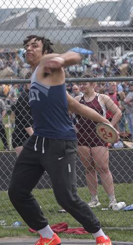 Merrimack Valley's Aiden Paquette throws the discus at the Sanborn Invitational at Sanborn Regional High School in Kingston on Saturday, April 19, 2025. Paquette medaled in two events, finishing fourth in the discus and setting a meet record to win the triple jump. Paquette leapt 43 feet, 11.25 inches for the record-setting mark. DAVIO DELUCA / NHXCTF