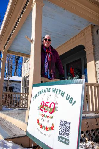 Hometown Hero RebeccaCourser sits on the front porch of the Upton Chandler House Museum in downtown Warner on Wednesday, January 22, 2025. The town of Warner just celebrated its 250th Birthday.