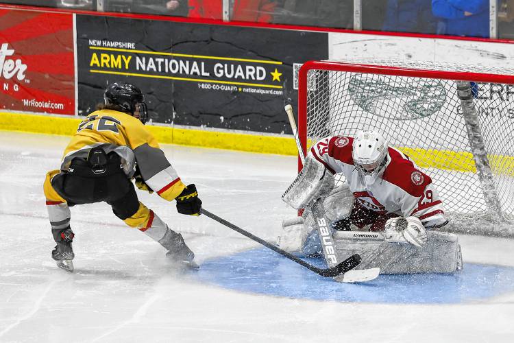 Concord goalie Carter Heise (29) makes a save against No. 8 Manchester on Saturday night. He made 12 saves and shut out the Kings.