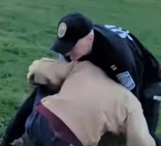 A video screenshot shows the arrest of UNH student Aidan Turner by UNH police officer and department prosecutor Frank Weeks following a protest on campus May 1.