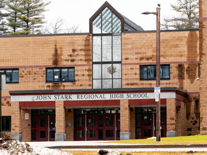 Parents complain school district didn't do enough after racist death threat at John Stark Regional High School.