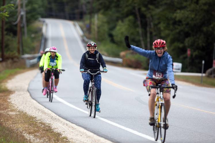 Participants ride along Rt. 127 in Hopkinton during their 30-mile trek for the bicycle fundraiser for the Pedaling for Hope Fund at Concord Hospital Payson Center for Cancer Care on Saturday, September 14, 2019. The event raised more than $157,000 to provide for cancer patients last year alone.