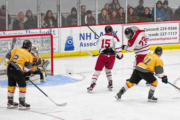 Junior forward Chad LaRiviere (23) scores Concord’s second goal of the night to blow the game wide open for the Tide during the first power play of the game in the second period.