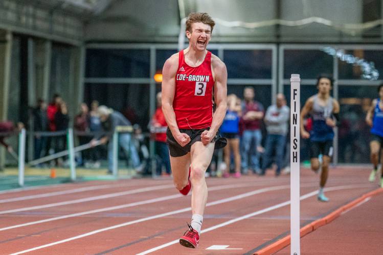 Coe-Brown’s Gavin Demas reacts after crossing the finish line to claim the state title in the 600 meters  at the NHIAA Division II indoor track and field championships at Dartmouth College on Feb. 12. While Demas has since graduated, the Bears still have many other athletes returning from last year’s championship team.