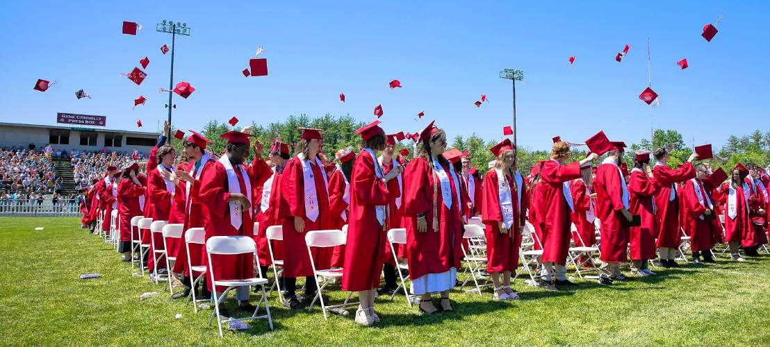 Concord High School graduates throw up their caps  at Memorial Field after receiving  their diplomas on Saturday, June 15, 2024.