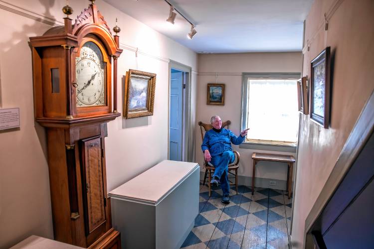 Hometown Hero RebeccaCourser sits among the antique items of the Upton Chandler House Museum in downtown Warner on Wednesday, January 22, 2025. The town of Warner just celebrated its 250th Birthday.