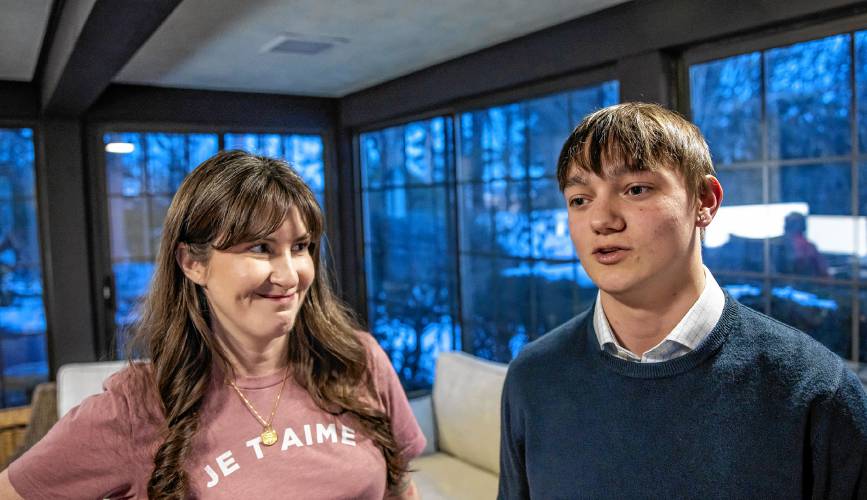 Dawson Hayes with his adopted mom, Carolyn Mallon, in their Concord home.
