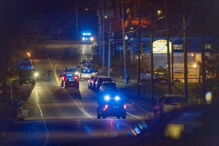 Police respond to an active shooter situation in Lewiston, Maine, Wednesday, Oct. 25, 2023. (AP Photo/Robert F. Bukaty)
