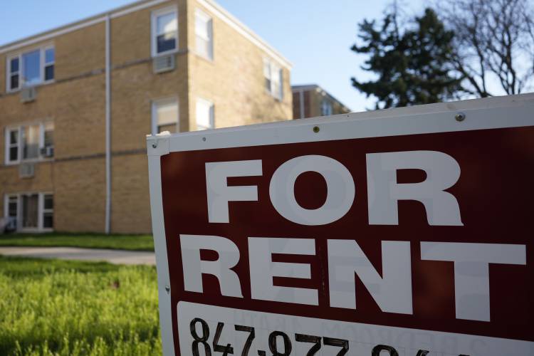 A “For Rent” sign displayed outside apartment building in Skokie, Ill., Sunday, April 14. A “For Rent” sign displayed outside apartment building in Skokie, Ill., Sunday, April 14.
