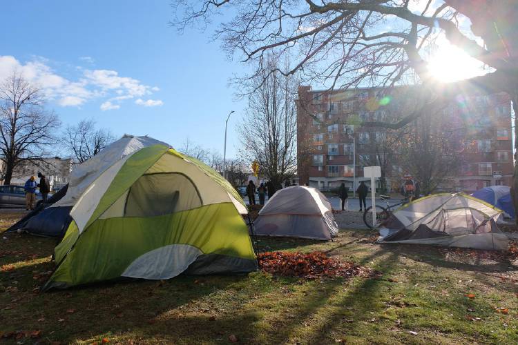 Protesters gathered to oppose the clearing of a homeless encampment in Manchester.