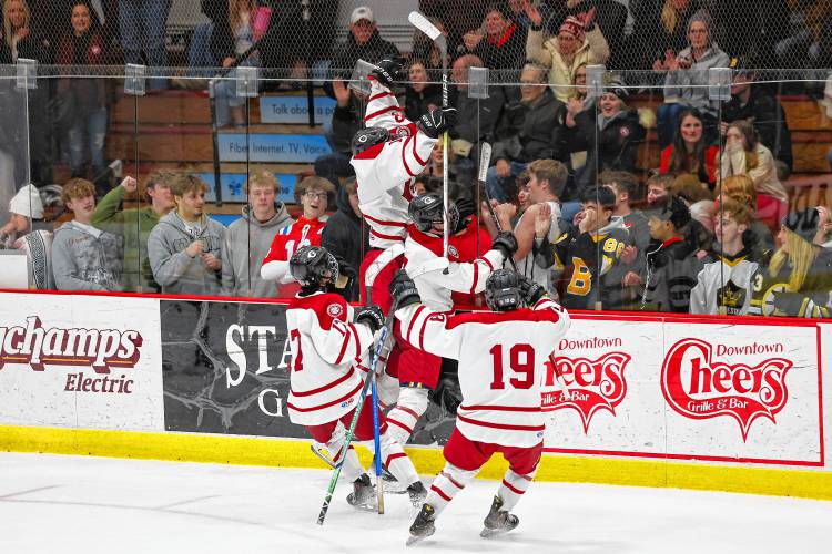 The top-seeded Concord boys’ hockey team celebrates one of its many goals on Saturday.