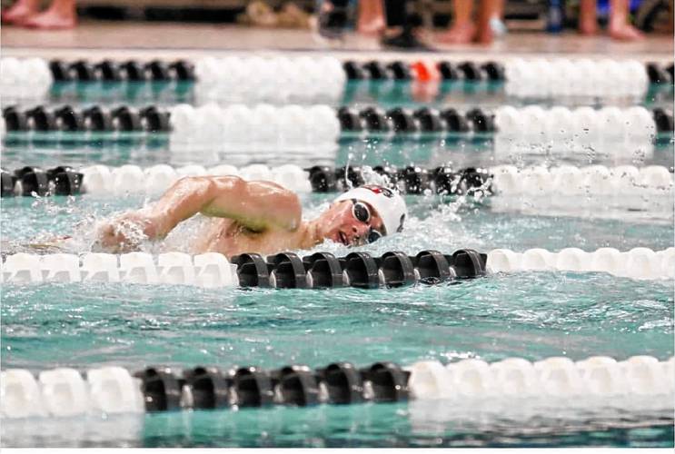 Coe-Brown Northwood Academy’s Chris Raymond competes at the NHIAA Division II swimming championship at the University of New Hampshire's Swasey Pool on Saturday. Raymond won both the 100- and 200-yard freestyle titles to lead Coe-Brown to third place in D-II.