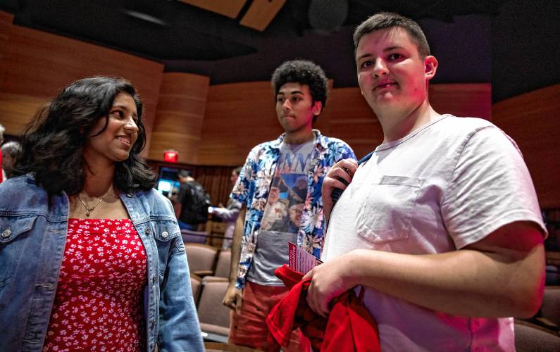Sumana Anand (left), Declan Young and Addison Dillion talk after the Republican governor debate at the Rosamond Page Putnam Center for the Performing Arts on the campus of New England College on Wednesday, September 4, 2024.