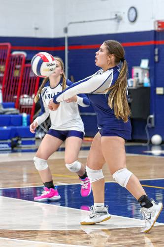 Merrimack Valley’s Taliyah Chudoba sets the ball for a teammate in the first game of the night against Kingswood on Friday.
