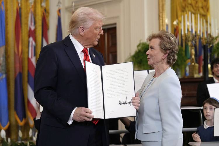 President Donald Trump holds up a signed executive order alongside Secretary of Education Linda McMahon in the East Room of the White House in Washington, Thursday, March 20, 2025. (AP Photo/Ben Curtis) President Donald Trump holds up a signed executive order alongside Secretary of Education Linda McMahon in the East Room of the White House in Washington, Thursday, March 20, 2025. (AP Photo/Ben Curtis)