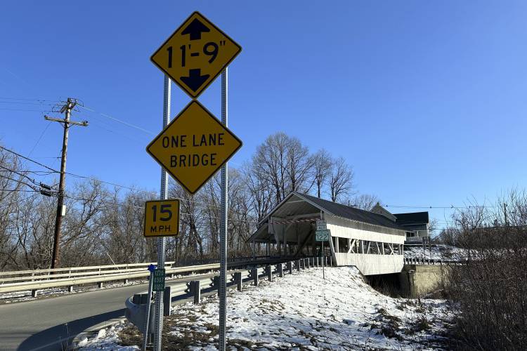 The Miller's Run covered bridge is shown on Tuesday, March 12, 2024 in Lyndon, Vt. The historic bridge is under threat from truck drivers using GPS meant for cars that continually hit the bridge. (AP Photo/Lisa Rathke)