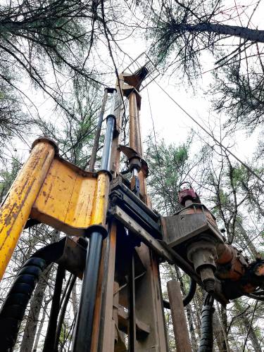 The boring machine that took soil samples on the middle school site in the woods near Broken Ground School.