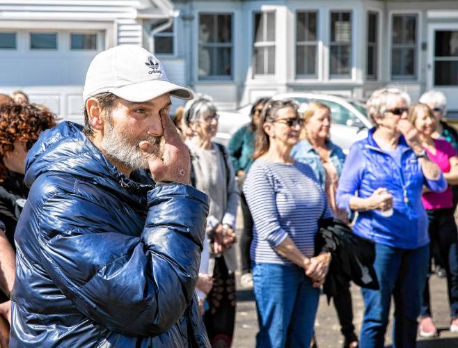 Larry Regan gets emotional at the grand opening  at the Pleasant Street complex on Tuesday, where he will now have an apartment.