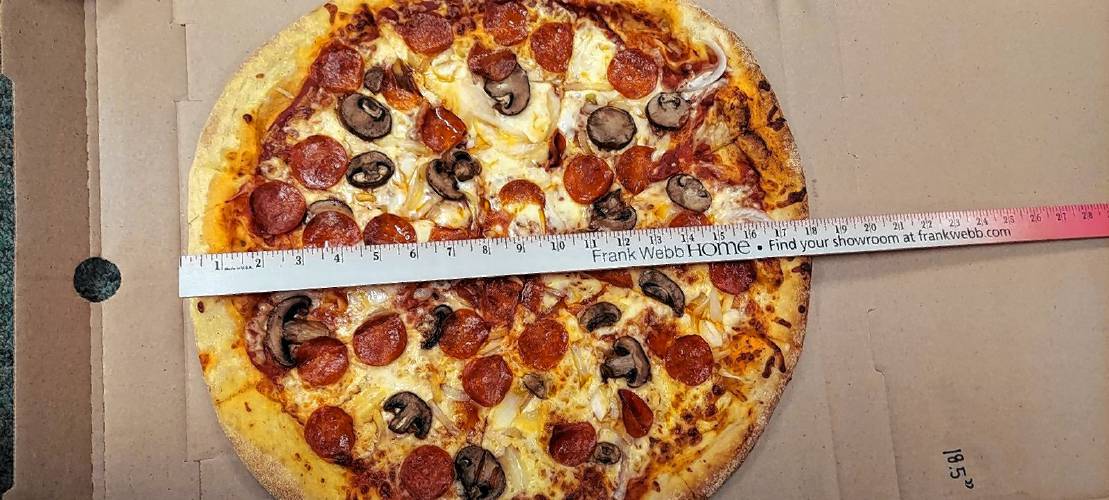 Market Basket, the popular supermarket chain advertises 19-inch pizzas that it serves in 18-inch boxes. The Concord Monitor got out the ruler. 