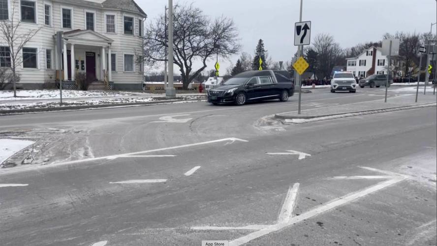 Law enforcement from around the state escort a hearse carrying fallen border patrol agent David Maland from the UVM Medical Center morgue to a funeral home in Burlington, Vt., Thursday, Jan. 23, 2025. (WCAX via AP)