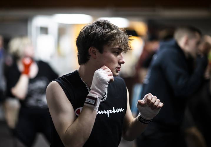 Ronny Philbrick warms up for his boxing class at Averill's Boxing in downtown Concord on March 7, 2024. Philbrick is hoping to box in the future and takes the class with his brother, Ritchie.