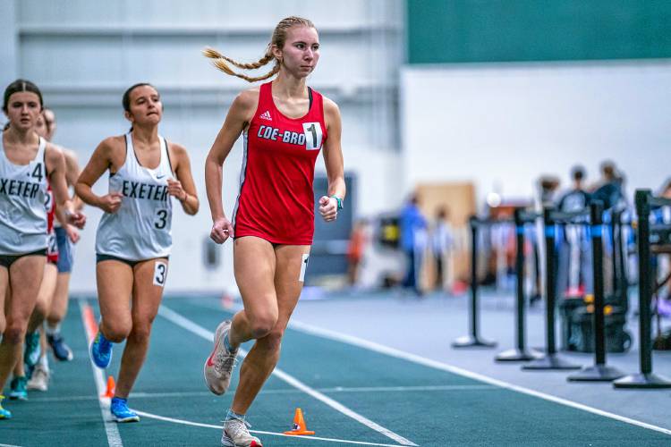 Coe-Brown’s Annabelle Lovett races in the 1,500 on Saturday at Plymouth State. Lovett won the 1,500 to lead Coe-Brown to third a a team.
