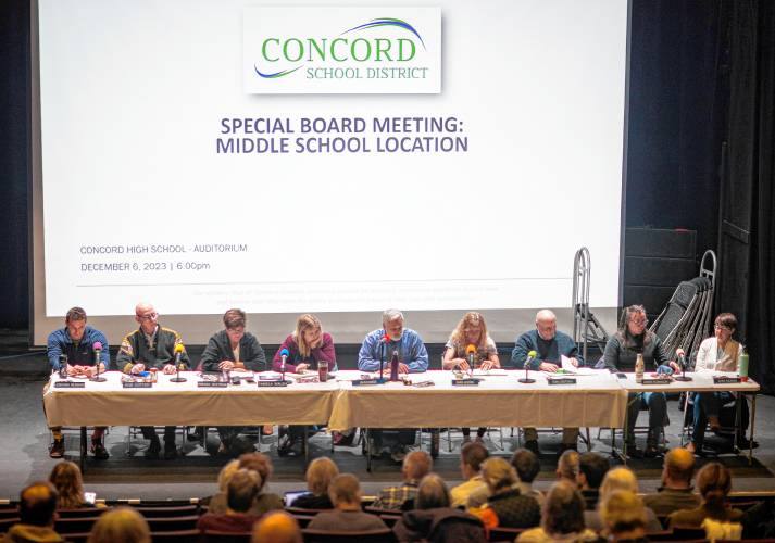 The Concord School Board at the opening of the meeting on Wednesday, December 6, 2023. The board voted to build the new school on the Broken Ground School site.