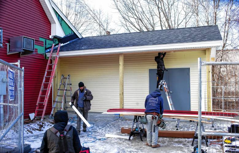 Construction of the expanded area off of the Friendly Kitchen main building which will house a storage area.