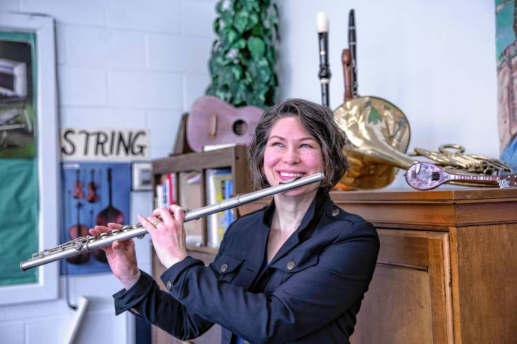 Nicole Densmore, whoâs been teaching and playing music in the Lake Sunapee region for 25 years. âOur motto (in class) is, âThe purpose of this class is to use music to show children the beauty of the world.â â