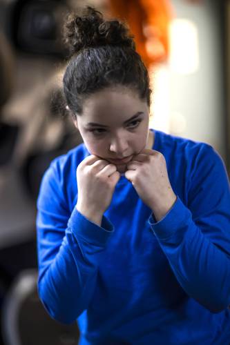 Ada Sansone warms up for her boxing class with her dad, Ken, at the Averill's Boxing in downton Concord on Thursday, March 7, 2024.