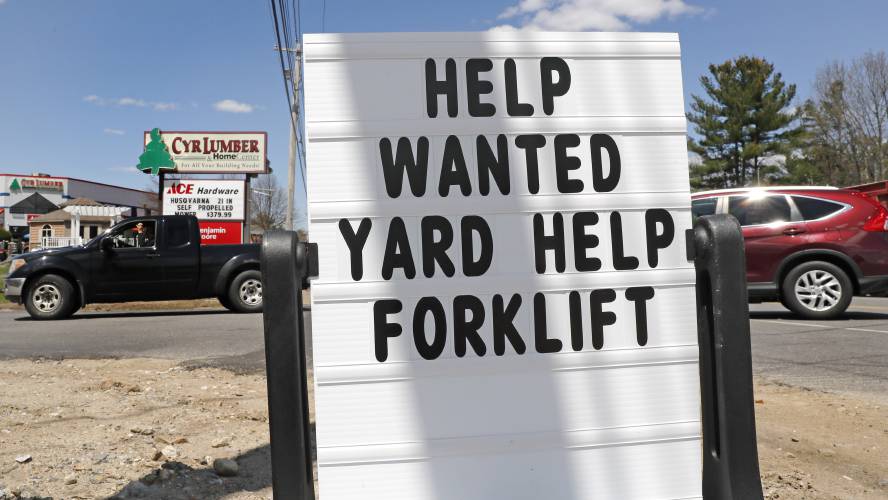 A help wanted sign is posted outside Cyr Lumber in Windham, N.H., Thursday, May 7, 2020. Roughly 33.5 million people have now filed for jobless aid in the seven weeks since the coronavirus began forcing millions of companies to close their doors and slash their workforces. (AP Photo/Charles Krupa) A help wanted sign is posted outside Cyr Lumber in Windham, N.H., Thursday, May 7, 2020. Roughly 33.5 million people have now filed for jobless aid in the seven weeks since the coronavirus began forcing millions of companies to close their doors and slash their workforces. (AP Photo/Charles Krupa)