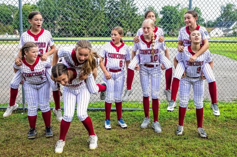 LEFT: The Concord Little League team plays around before their championship ceremony and practice at Rollins Park.
