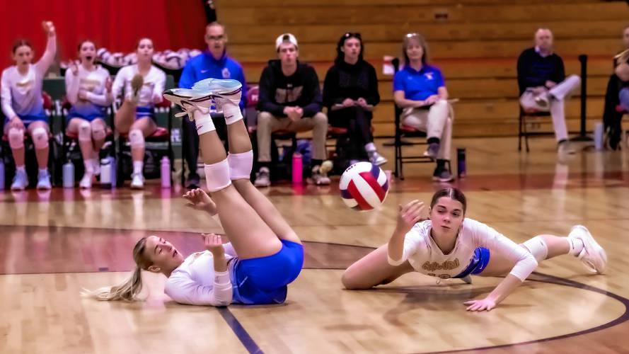 Concord Christian players Lylah Shumway (left) and Sadie Thompson nearly collide trying to reach the ball during their Division III title match against Inter-Lakes on Saturday. The Kingsmen lost to the top-ranked Lakers, 3-1.