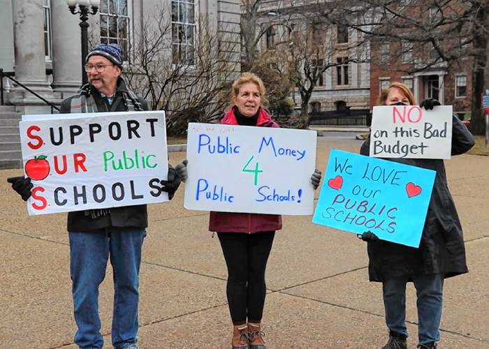 Advocates for school funding gathered outside the NH State House on April 6, 2023, as House members prepared to vote on the state budget.