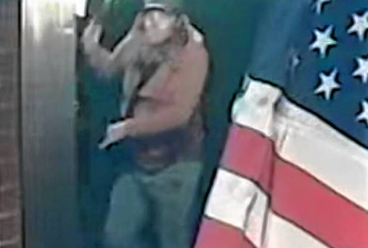 Surveillance footage released by the Portsmouth Police show a man wielding a hammer outside Temple Israel Monday evening, April 8, 2024. Surveillance footage released by the Portsmouth Police show a man wielding a hammer outside Temple Israel Monday evening, April 8, 2024.
