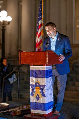 U.S. Rep. Chris Pappas talks to the crowd at the State House on the anniversary of the Hamas attack on Israel on October 7, 2024.