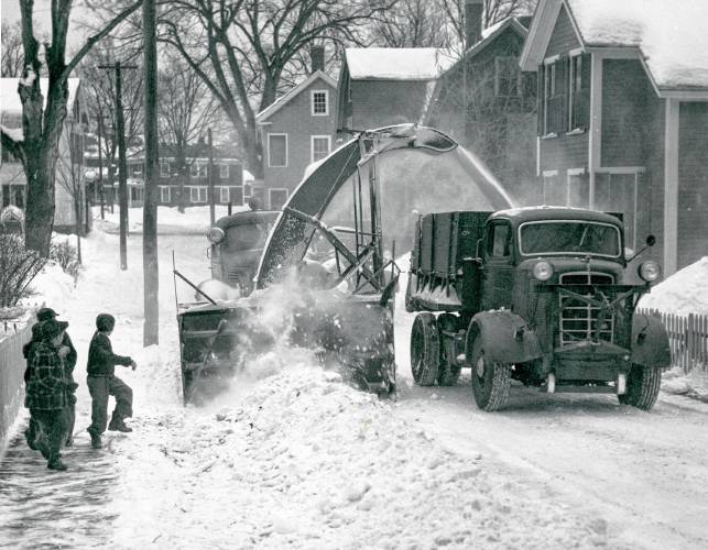 A photo of snow cleanup in 1948 from the Concord Public Library Digital Collections, which goes live on December 9.
