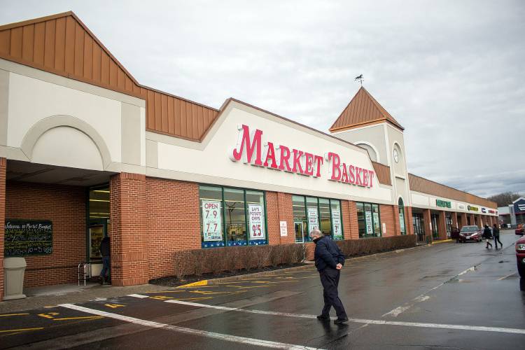 A customer walks into Market Basket at Fort Eddy Road in Concord. A customer walks into Market Basket at Fort Eddy Road in Concord.